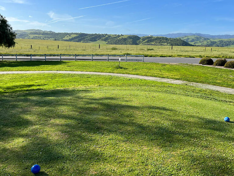 Ridgemark Golf Club & Resort teeing area with green hills and open countryside views.